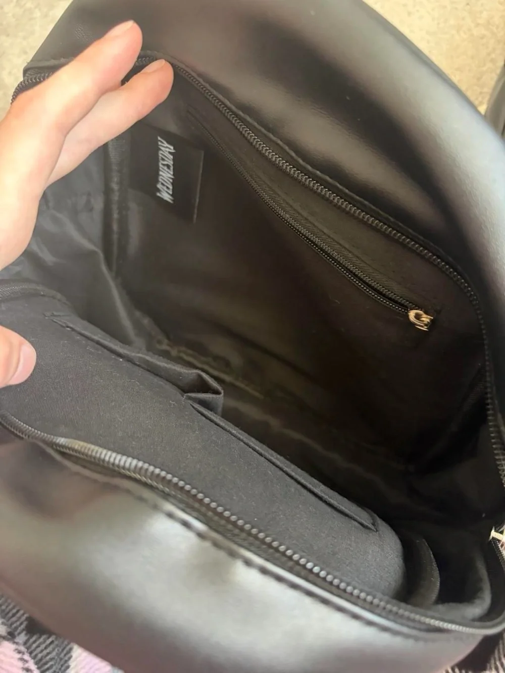 Black Mini Backpack with Crest and Stripe Accent